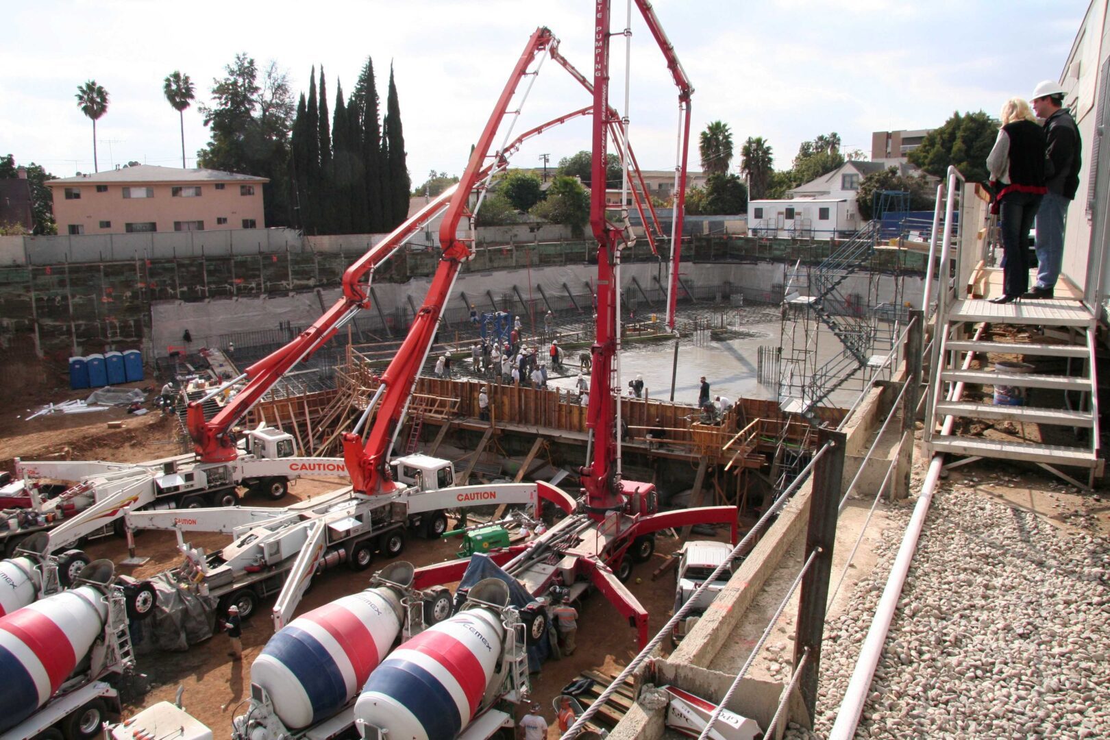 A group of people on a construction site.